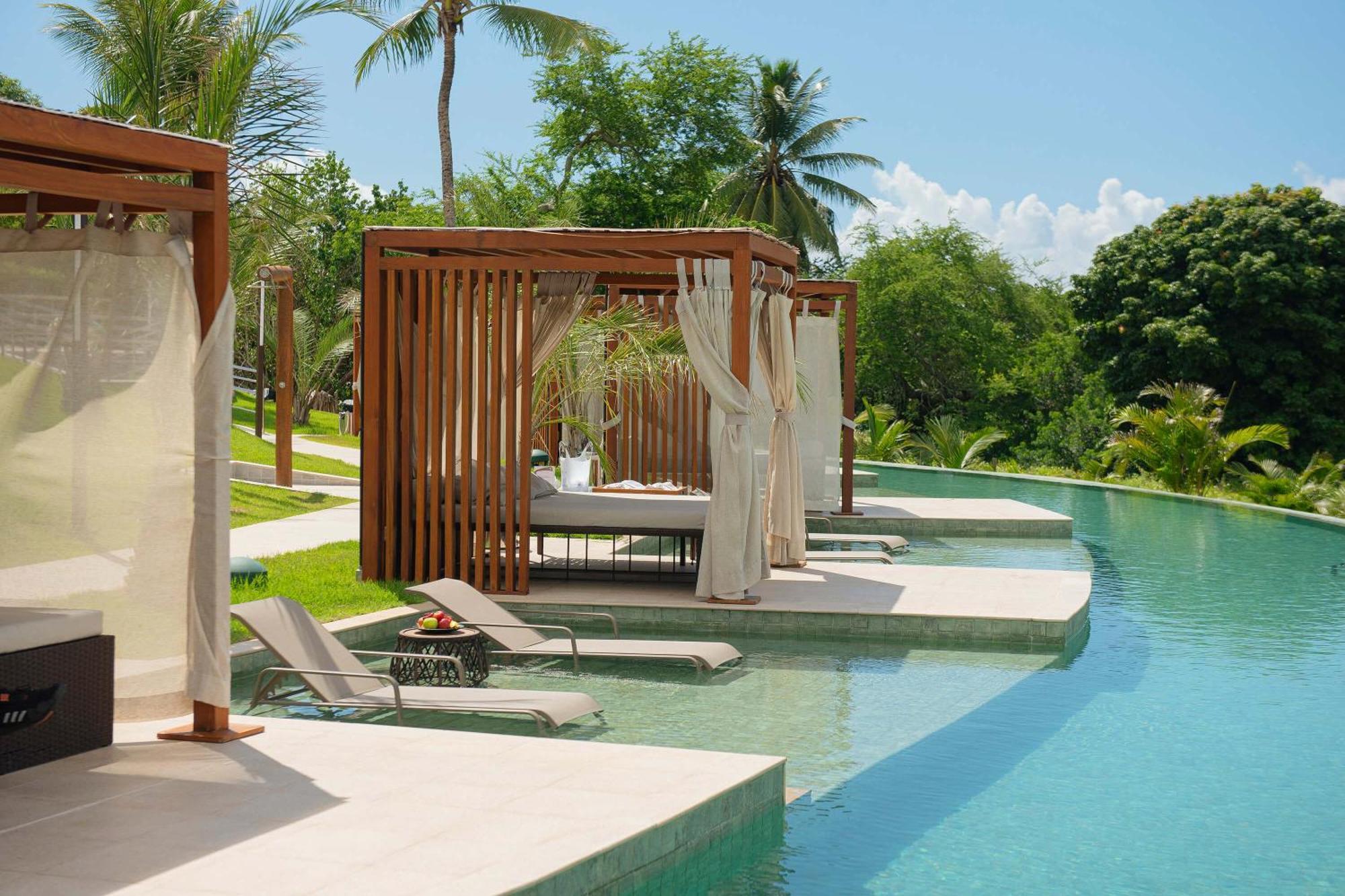 Hotel Deville Prime Сальвадор Экстерьер фото The swimming pool at the resort